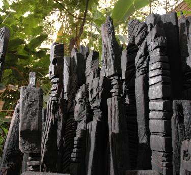 Carved wooden sculpture in Rainforest Biome at Eden Project